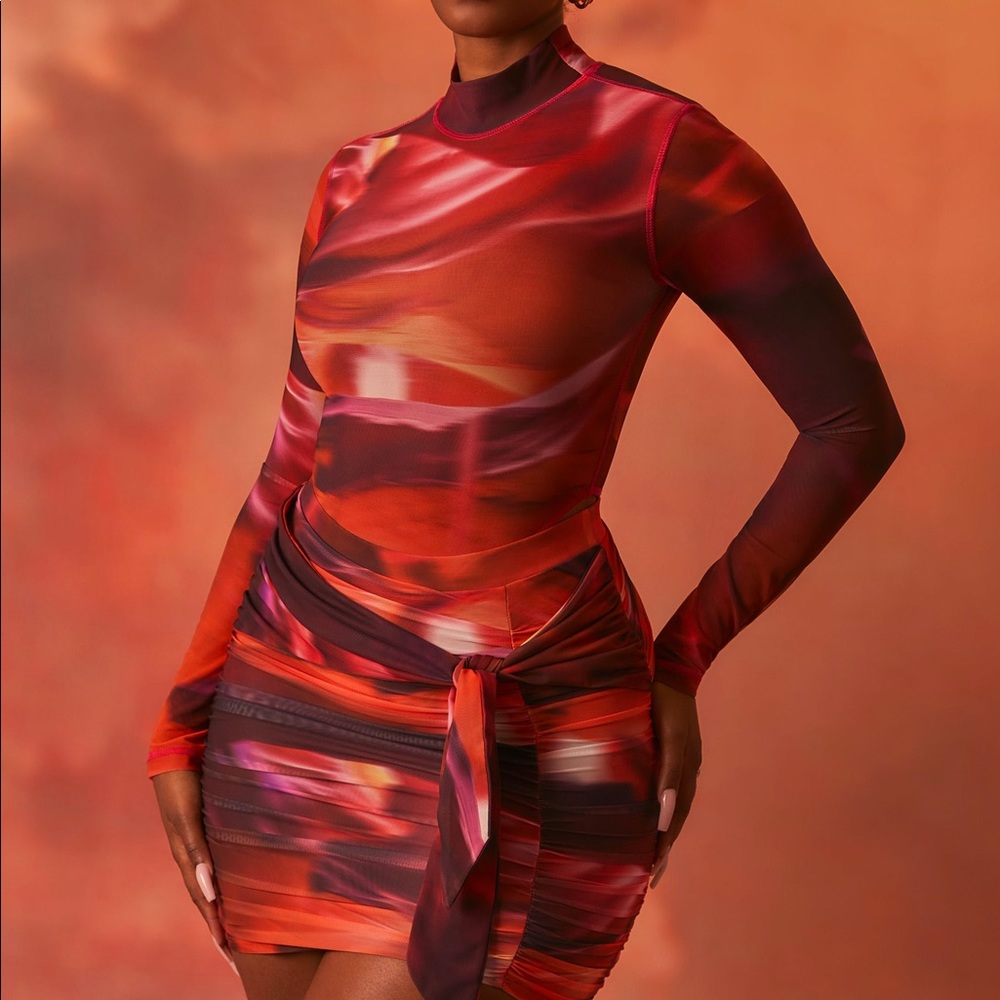 SUPERNOVA
HIGH NECK LONG SLEEVE MESH BODYSUIT IN ORANGE